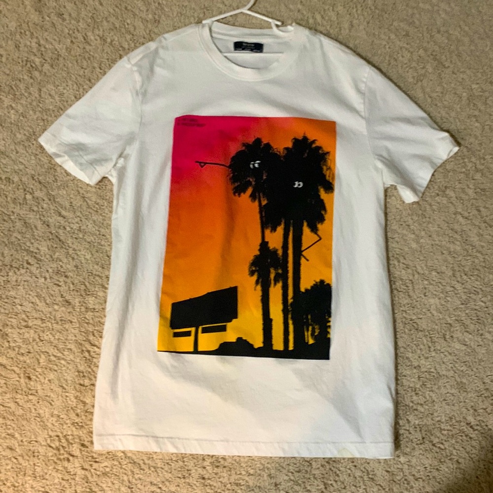 Lightly worn medium graphic tee from bershka